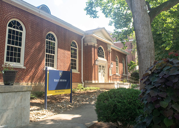 The outside exterior of the Reece Museum in the summer.